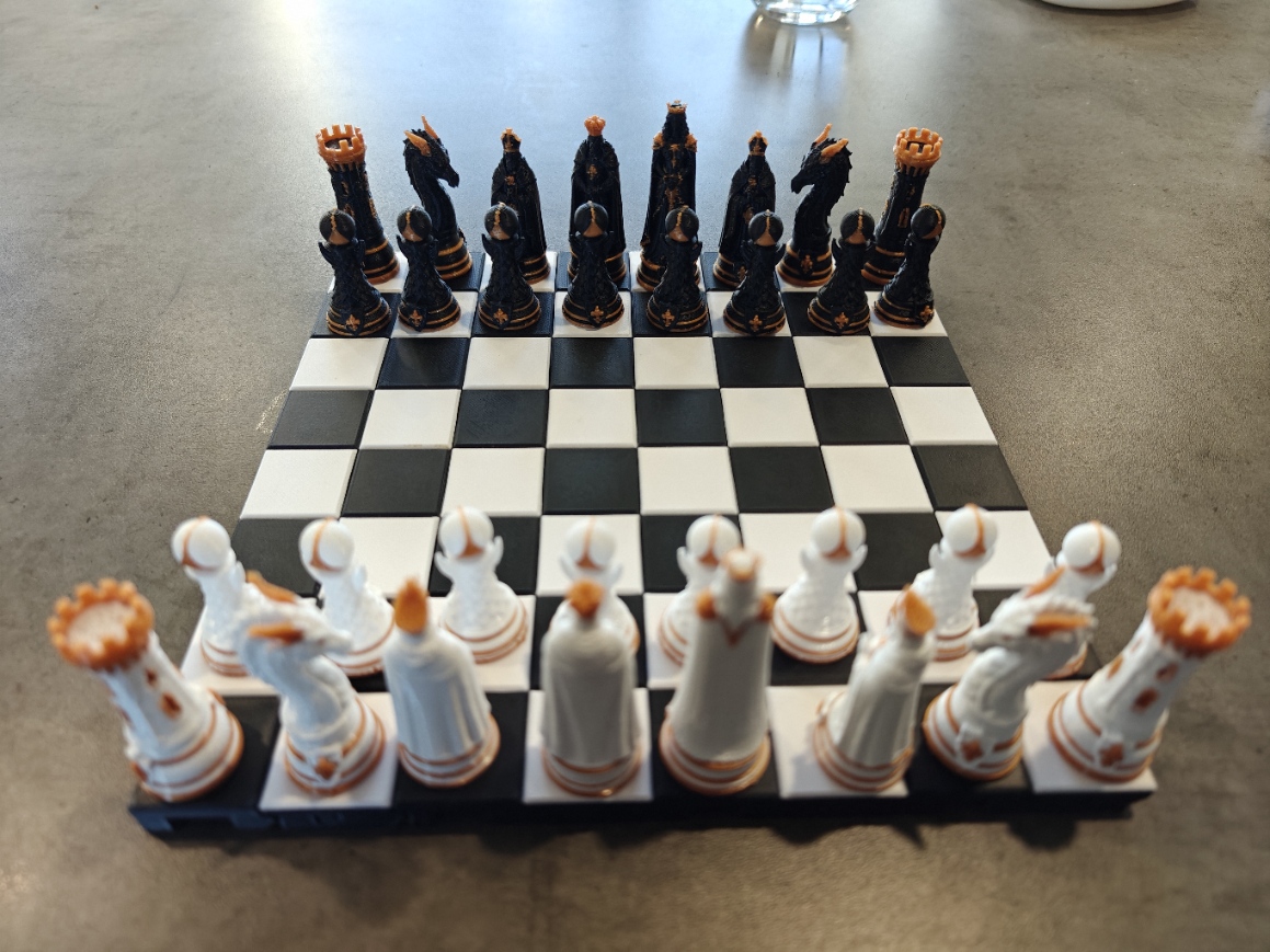 Quality3Ds fantasy chess pieces facing each other on a display board.