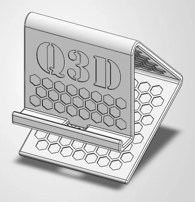 CAD render of the Q3D phone stand with the logo, honeycomb pattern and cable slot.