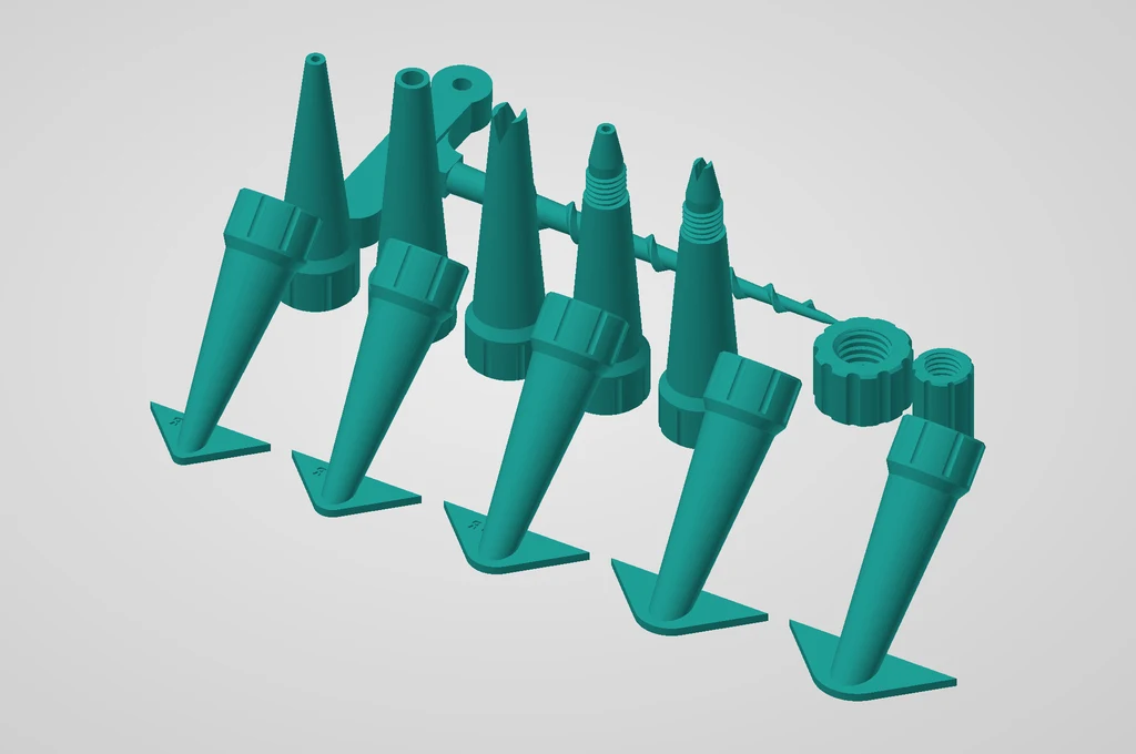 Render of the Q3D SealMate nozzle kit in print orientation: five finishing tips with angled shoes, five screw-on nozzles, a screw nozzle cleaner, a cartridge cap and a tip cap.